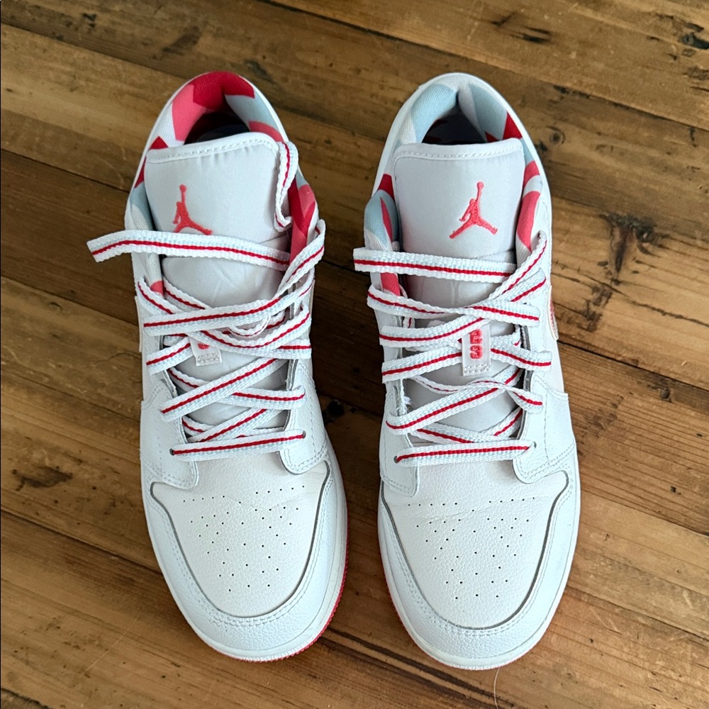 Kids Air Jordan White and Red Sneakers.